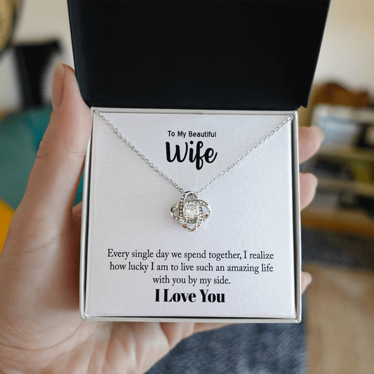 Love Knot pendant with two intertwined loops, close-up