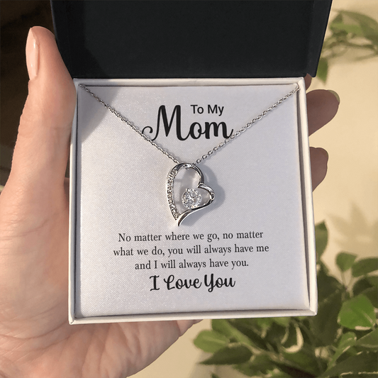 Held Close crystal heart pendant, close-up
