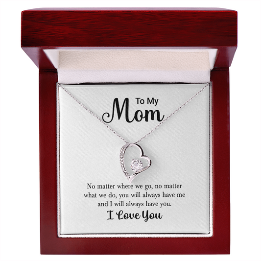 The Held Close Necklace for Mom with a crystal heart pendant