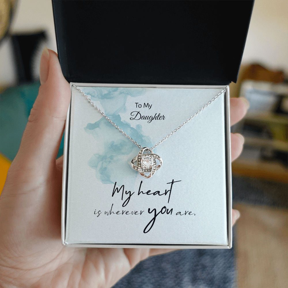 Love Knot pendant with two intertwined loops, close-up