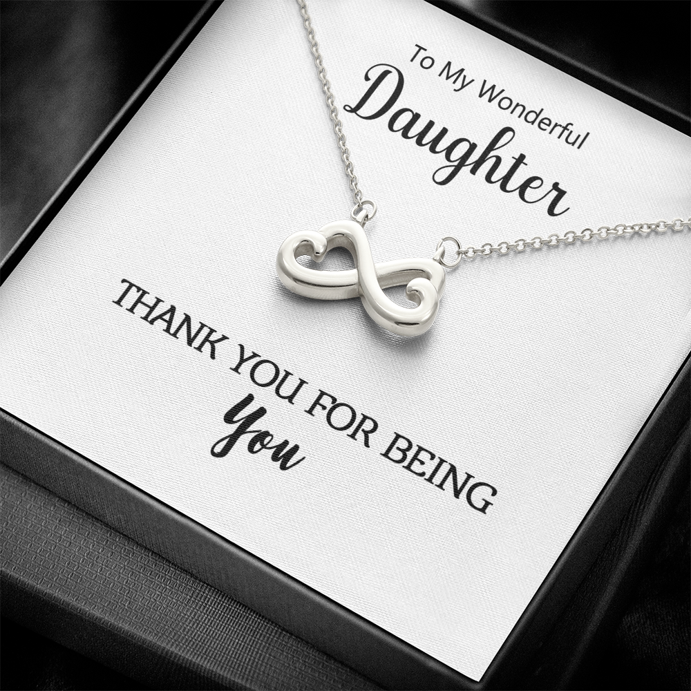 Infinite Love Necklace displayed with its message card