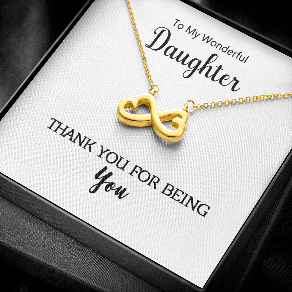 Woman wearing the Infinite Love Necklace