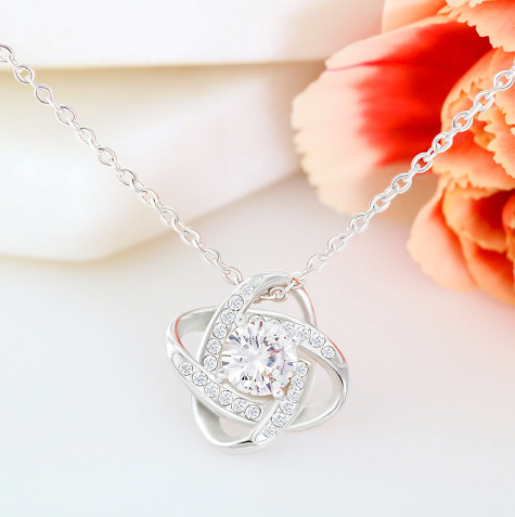 Woman wearing the Love Knot Necklace